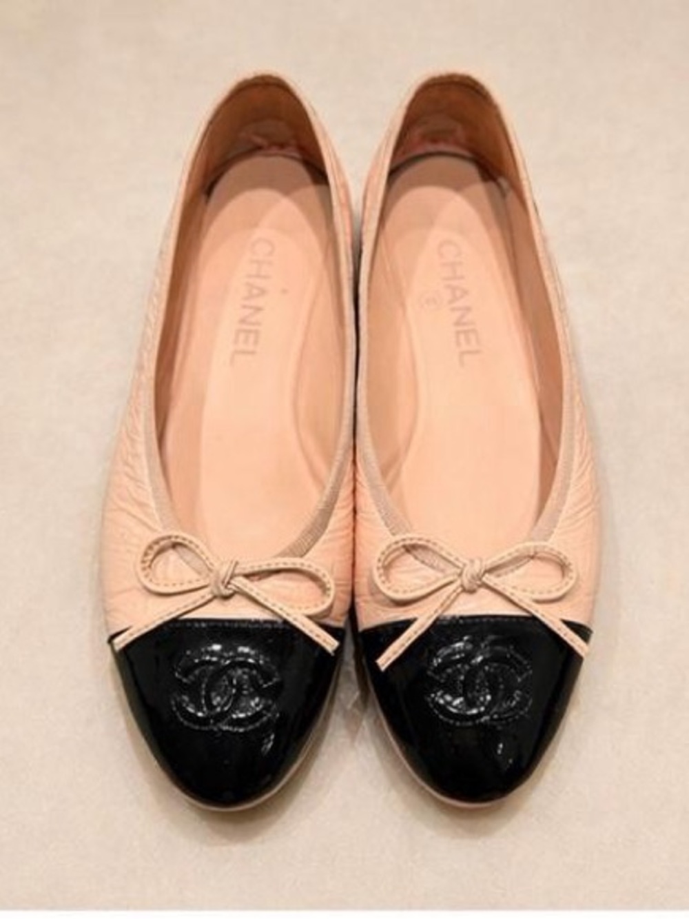 CHANEL Pale Pink Leather Ballet Flats with Black Patent Cap Toes